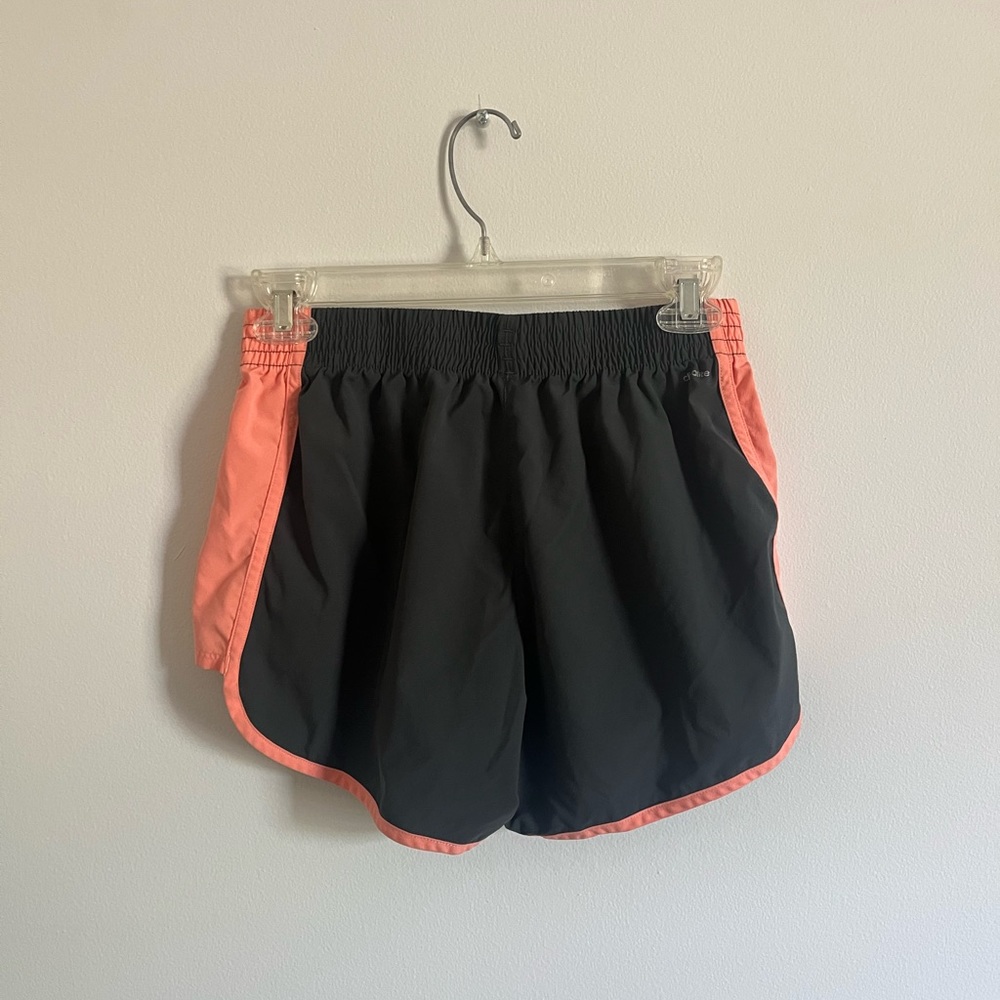 Adidas running shorts in dark grey with orange trim